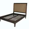 Wooden bed frame with woven headboard.