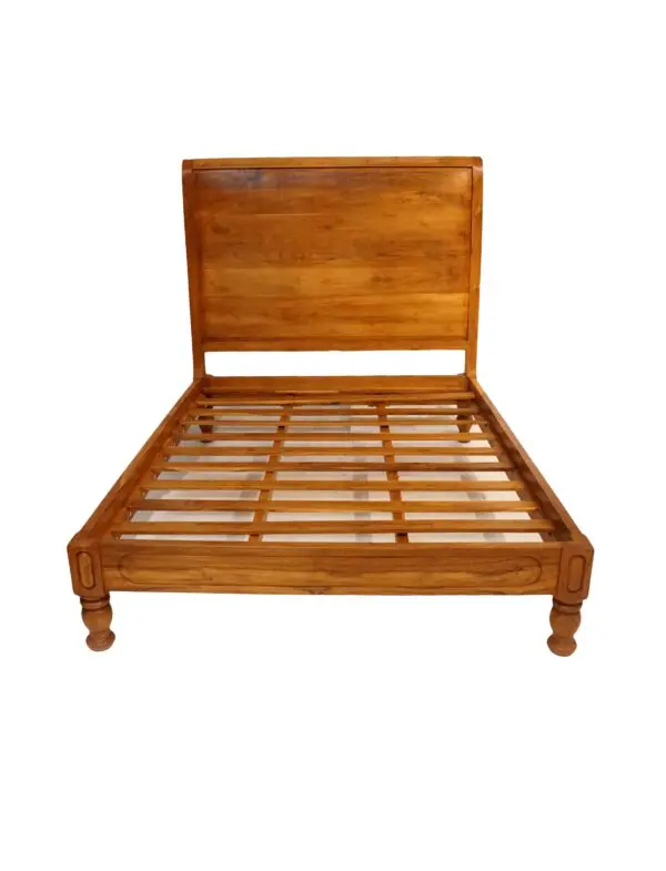 Wooden bed frame with slatted base.