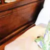 A bed with pillows and blankets on it