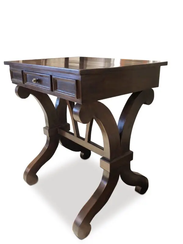 Wooden table with decorative curved legs.