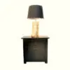 A lamp on top of a nightstand.