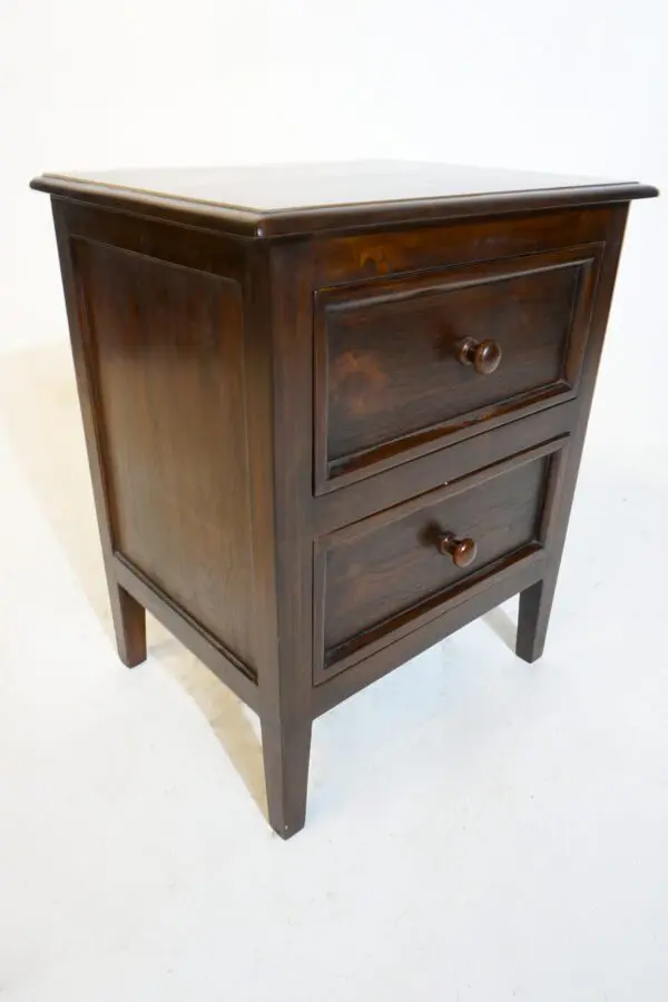 Wooden nightstand with two drawers.