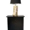 Nightstand with a unique lamp design.