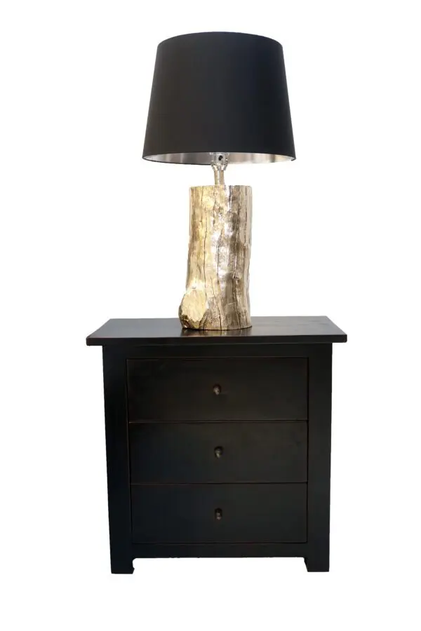 Nightstand with a unique lamp design.