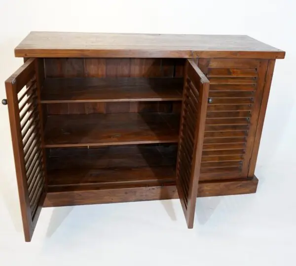 Wooden cabinet with open louvered doors.