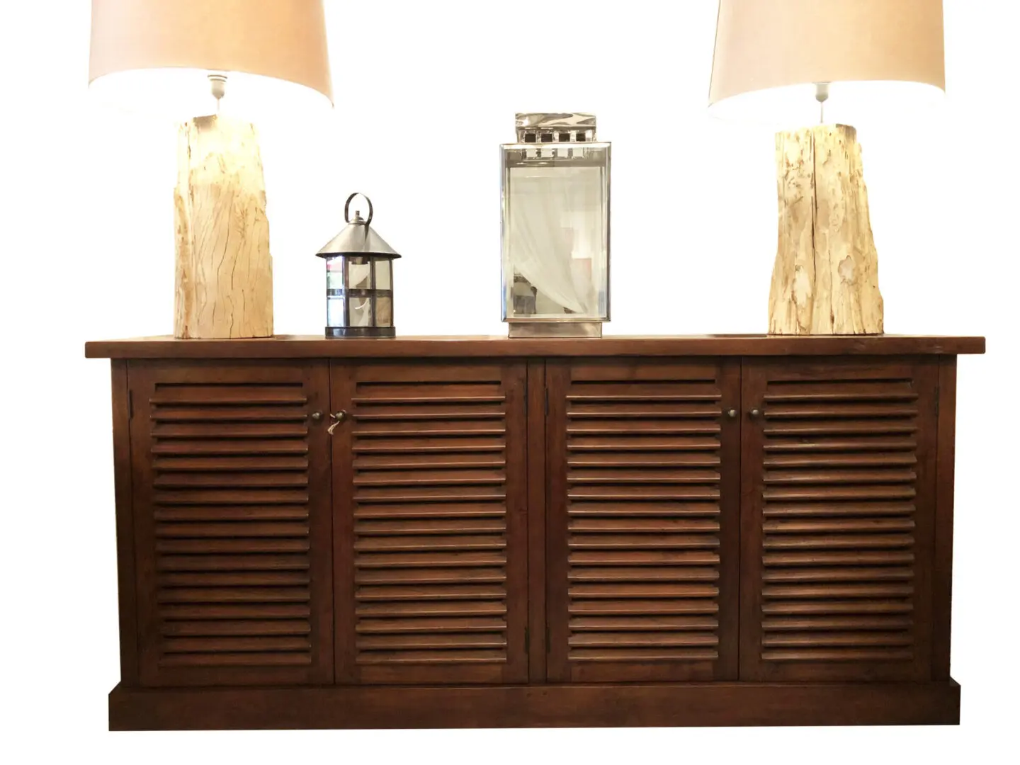 Wooden cabinet with shutter doors and lamps.