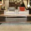 A living room with two chairs and a coffee table