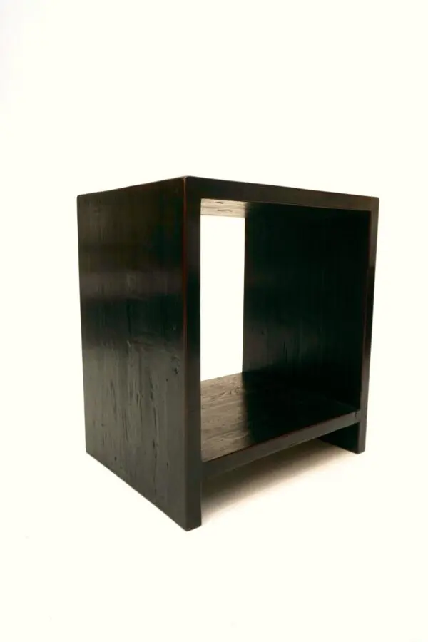 Modern dark wooden cube shelf unit.