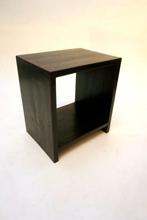 Modern wooden side table with open shelf.