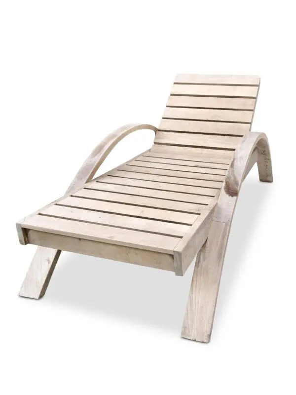 Outdoor wooden lounge chair with slatted design.