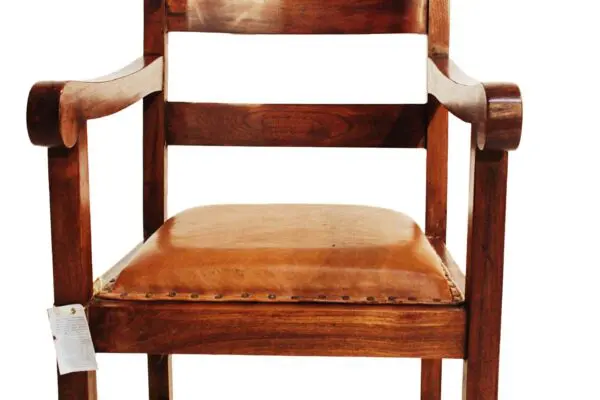 Wooden chair with leather seat and armrests.