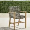 A wooden chair with a woven seat and back.