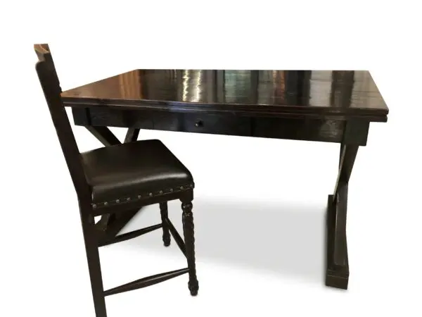 Black desk with a matching chair.