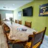 Conference room with wooden table and decor.