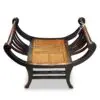 Traditional wooden chair with woven seat.
