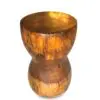 Wooden stool with a rounded shape.