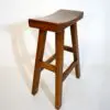 Wooden stool with simple design and shadow.