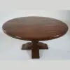 A round table with a pedestal base.