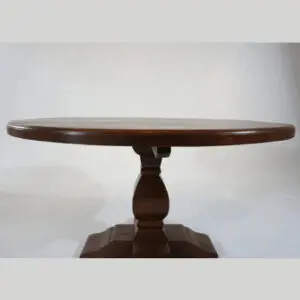 A round table with a pedestal base.