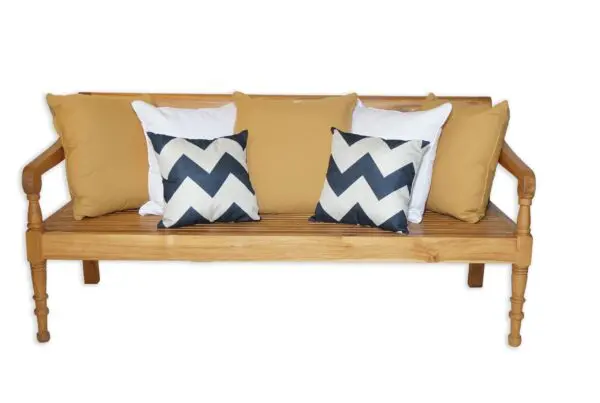 Wooden bench with decorative cushions.