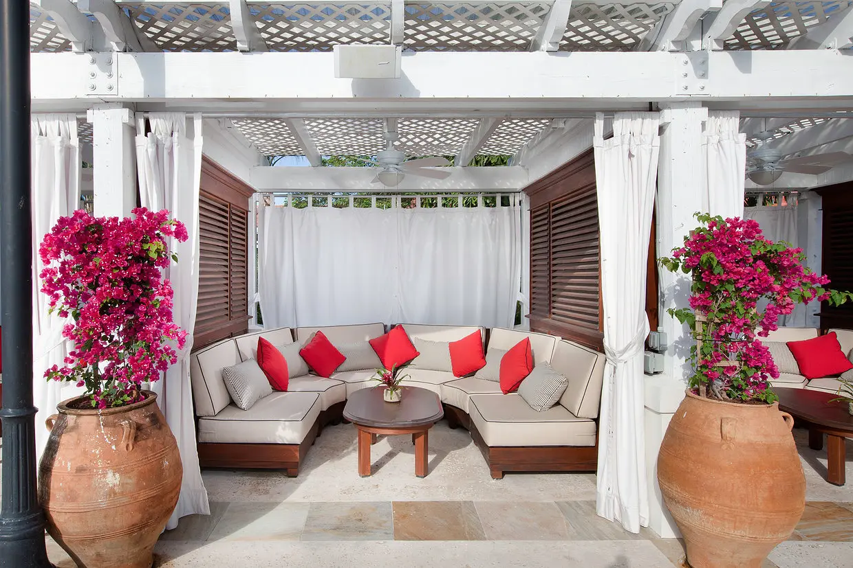 A living room with a couch and table