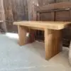 Wooden table against a rustic backdrop.
