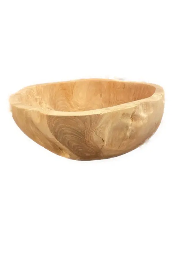 A wooden bowl with a leaf design on it.