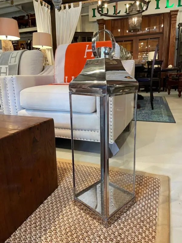 Decorative lantern on a wooden coffee table.