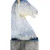 A horse statue is shown on top of a stone base.