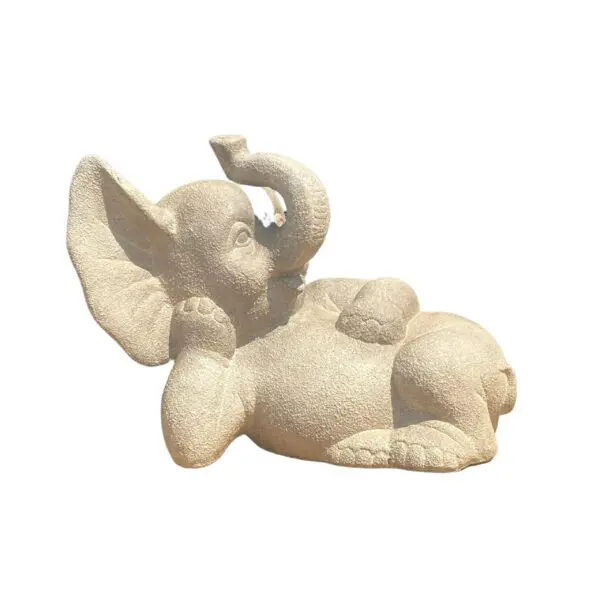 Sculpture of a playful lounging elephant.