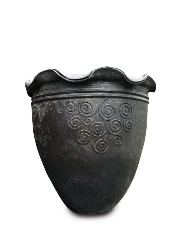 Decorative black pot with swirl patterns.