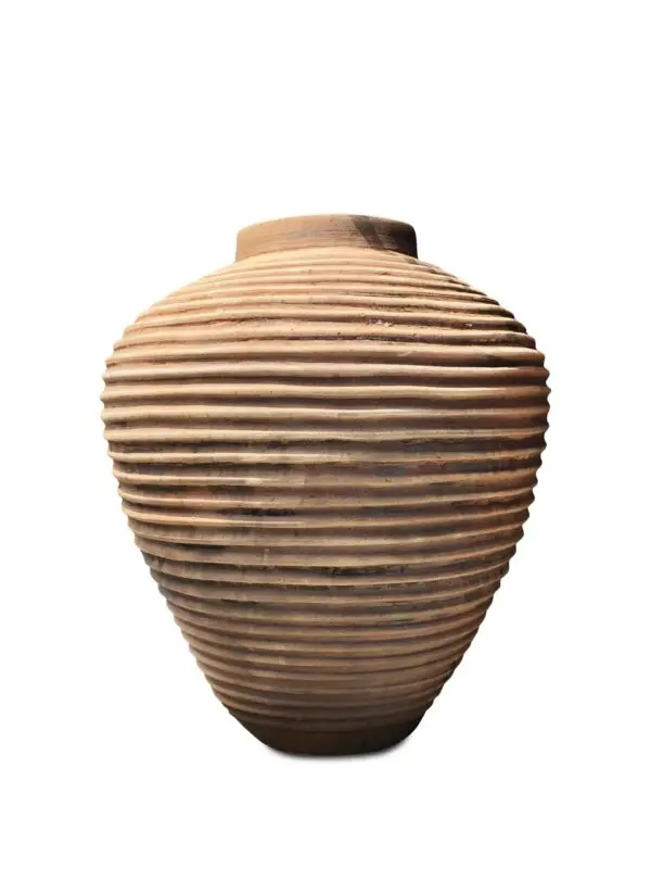 Textured clay vase with a round shape.