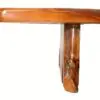 Wooden table edge with unique grain detail.