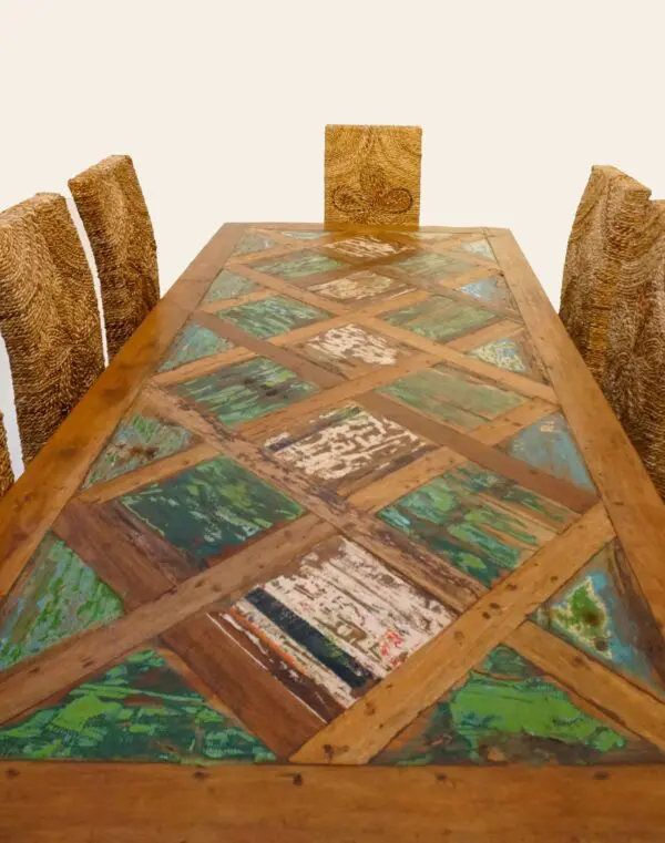 Artistic wooden dining table with unique chairs.