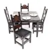 A table and chairs set up for dinner.