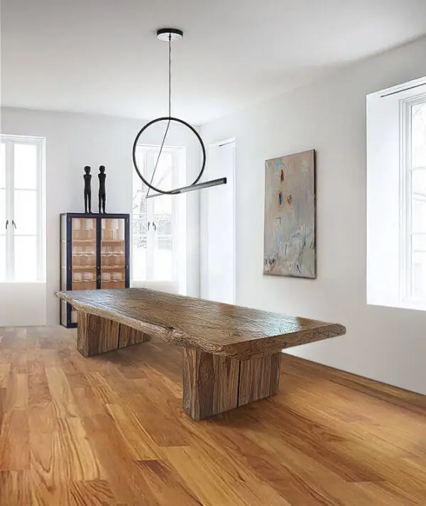 A large wooden table in the middle of a room.