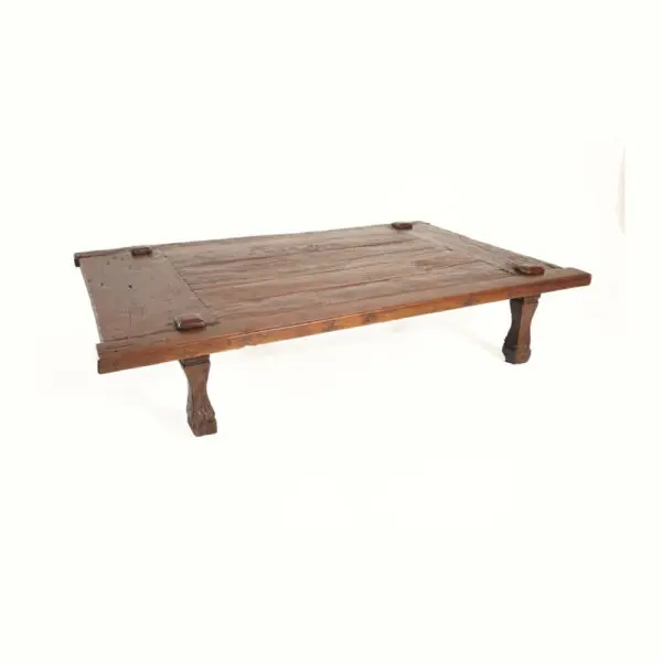 A wooden table with two legs and four feet.