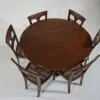 A table with six chairs around it