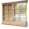 Wooden display cabinet with glass doors.