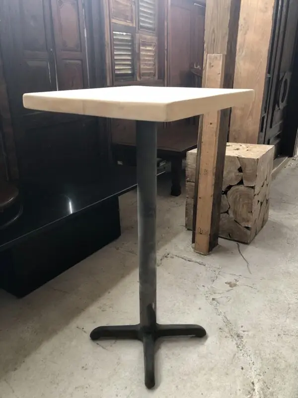 Wooden top table with metal base.