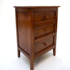 A wooden dresser with three drawers and a small table.