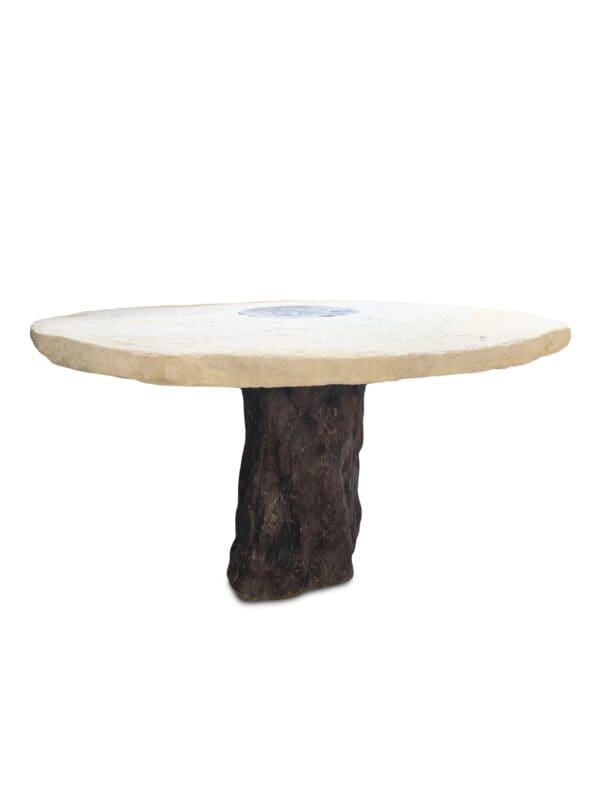 A table with a tree trunk base and a round top.