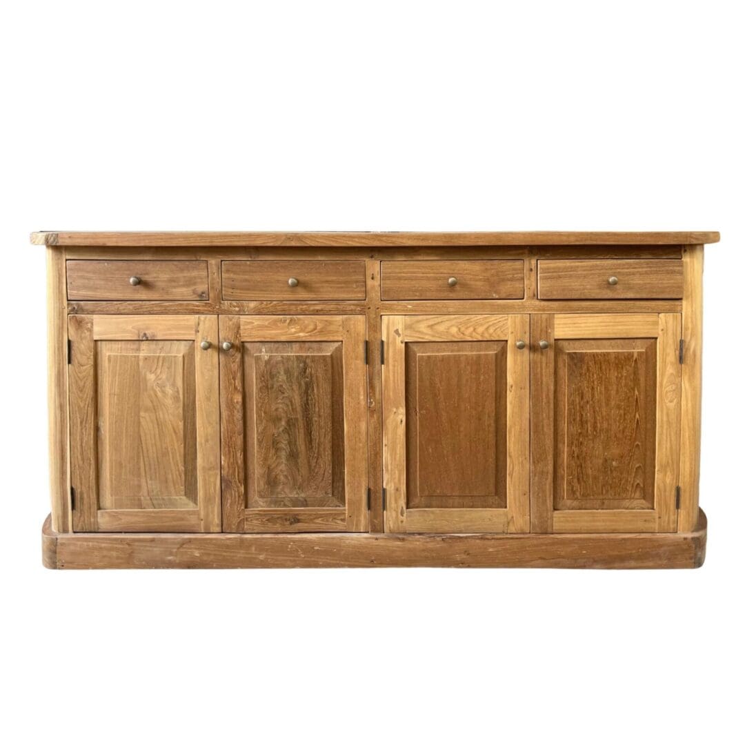 A large wooden cabinet with four drawers and two doors.