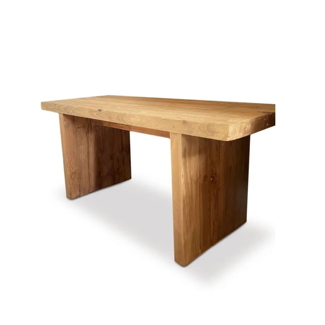 A wooden table with two legs on top of it.