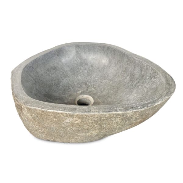 A stone sink with a single hole.