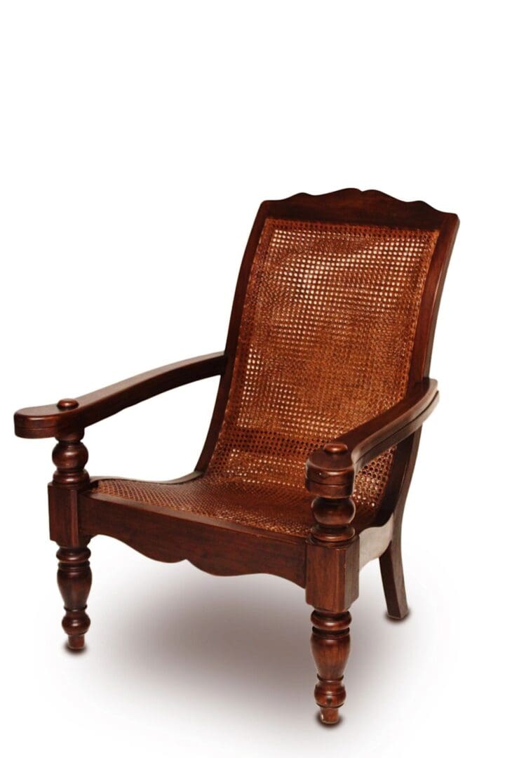 A wooden chair with a brown woven seat.