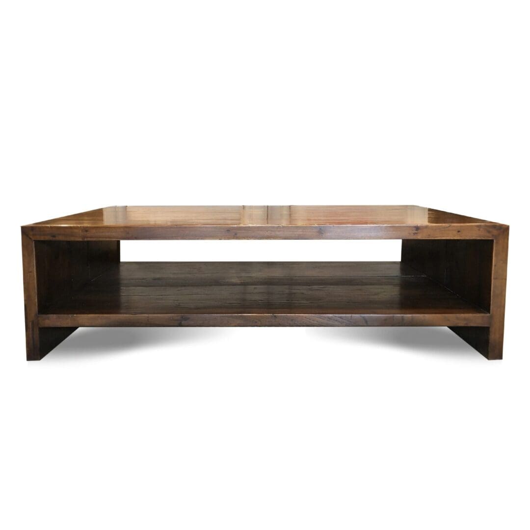 A coffee table with two shelves and a wooden top.