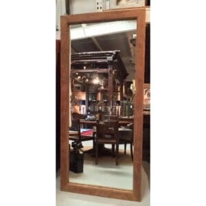 A large mirror in the middle of a room.