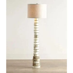 A lamp that is made of many different materials.