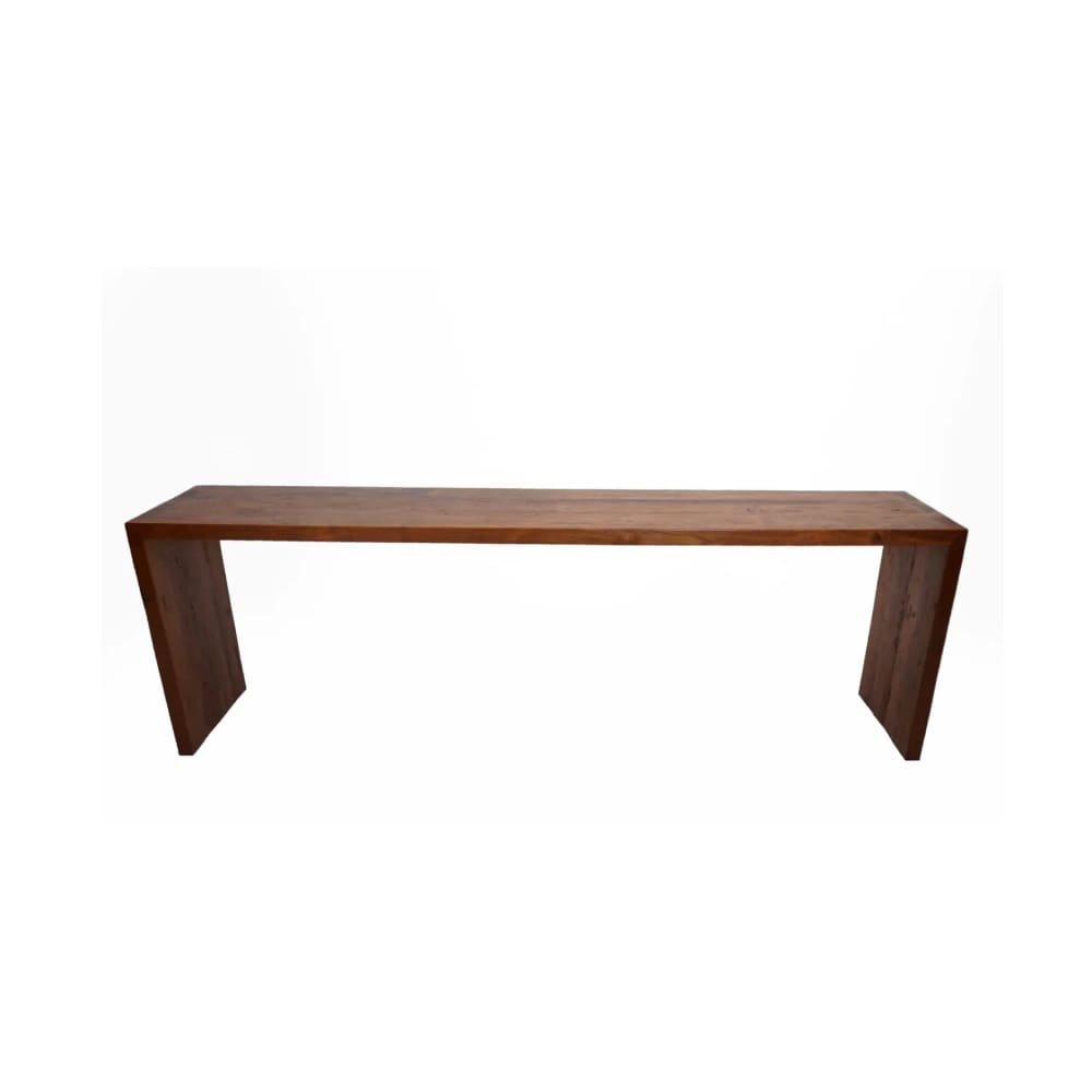 A wooden table with two legs and one leg missing.
